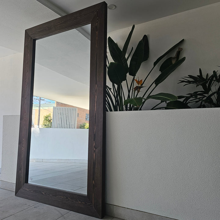 White wash and brown wood frame full-length mirrors