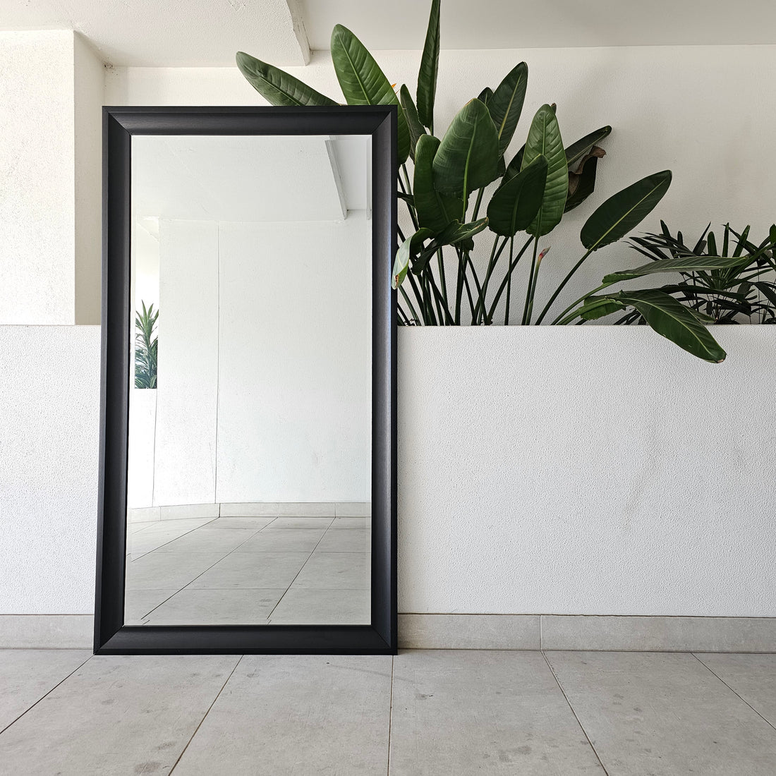 Thick Black full-length mirror with a wide black frame