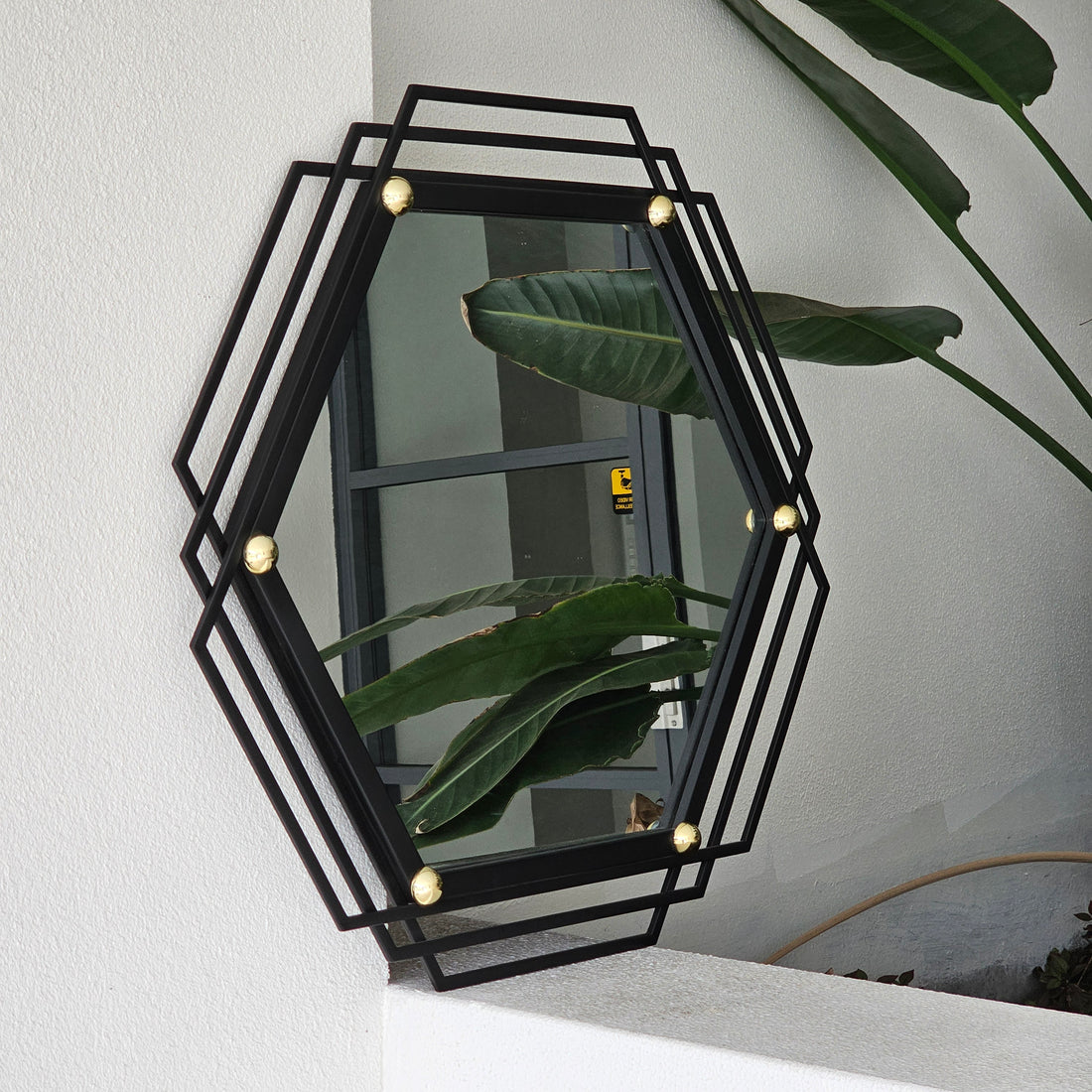 Hex black art deco irregular wall mirror, 70x60cm