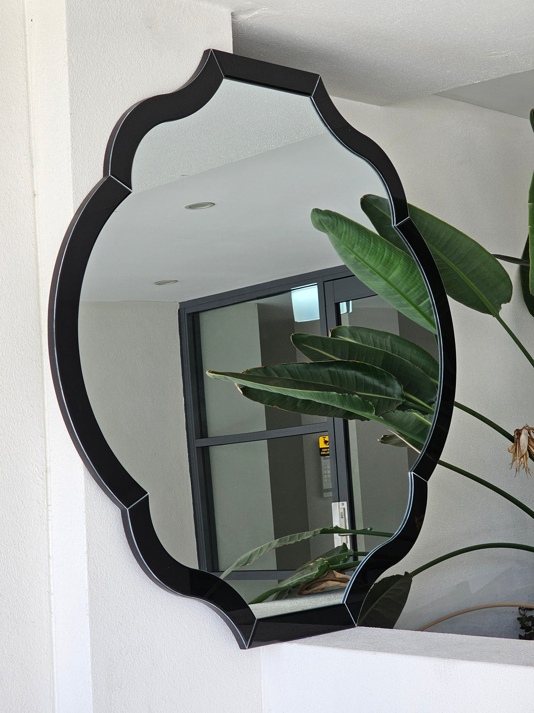 Rowla black scalloped flower-pattern wall mirror, 120x120cm