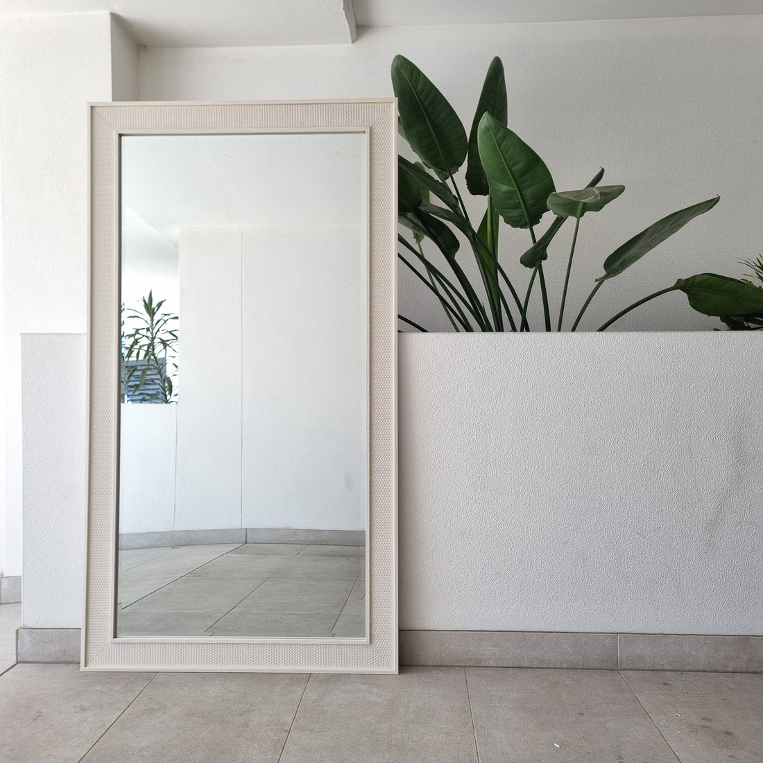 White C full-length mirror with a moulded rectangular frame