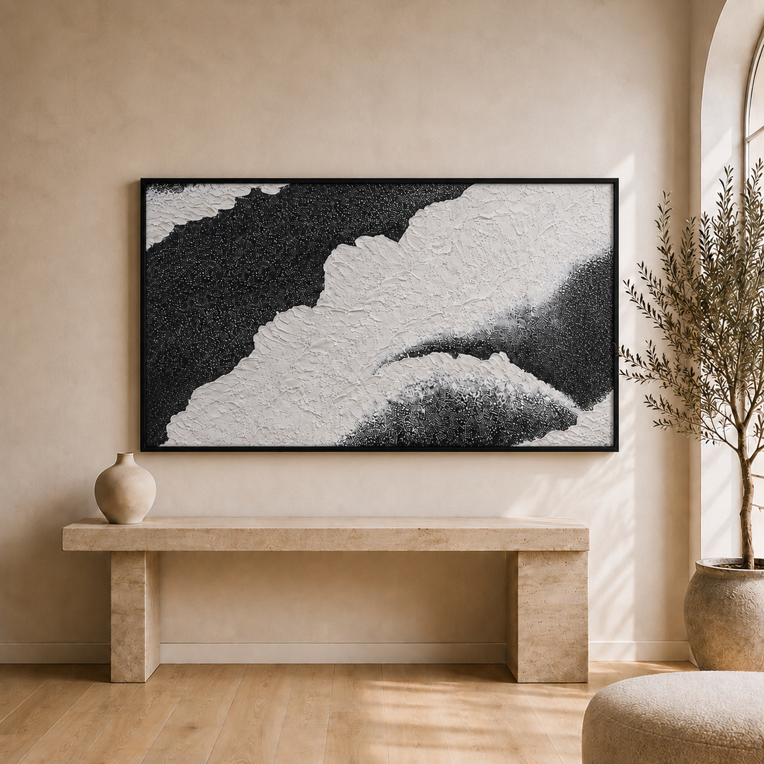 Close detail of Onyx wall art showing raised hand-applied micro-plaster relief and hard black and white contrast