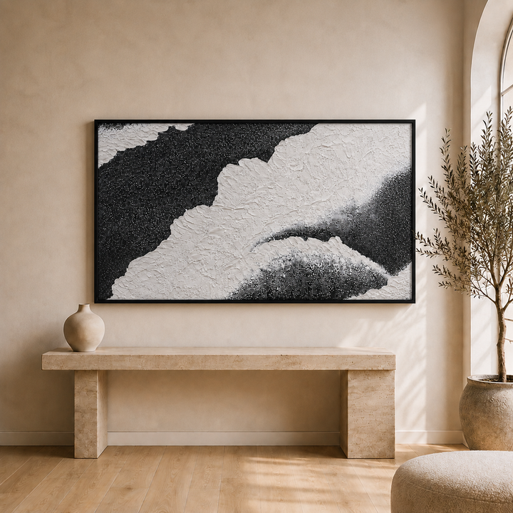 Close detail of Onyx wall art showing raised hand-applied micro-plaster relief and hard black and white contrast