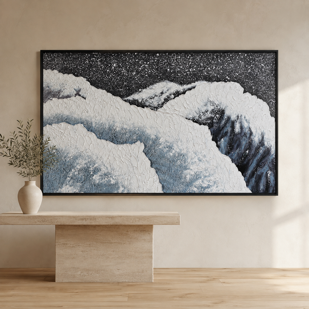Tide blue and grey 3D coastal wall art in a black frame, raised white plaster surf over slate blue water