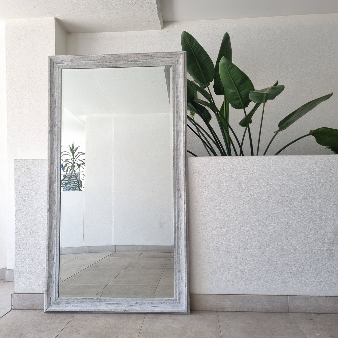Woodgrain blue full-length mirror with a timber frame