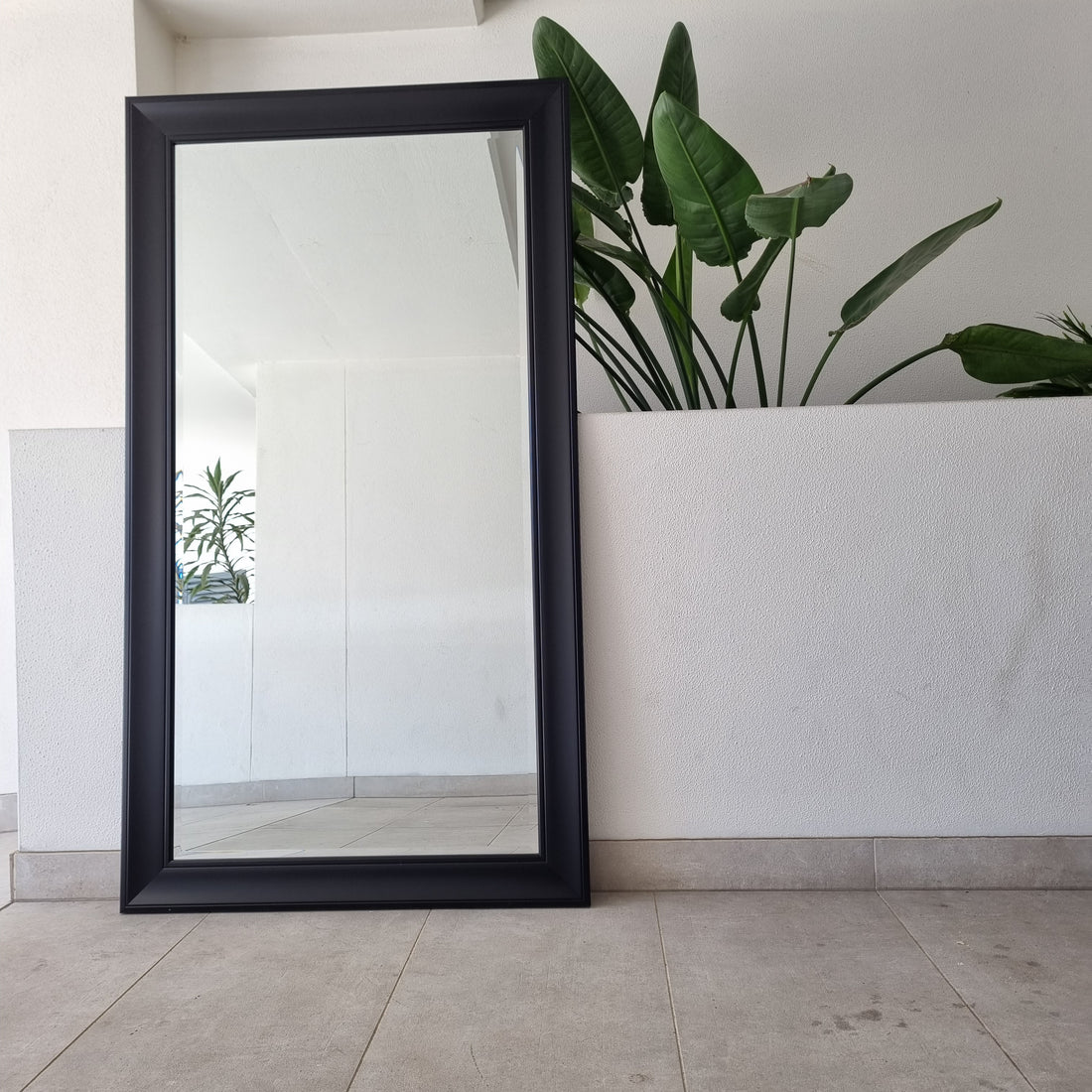 Black Flat full-length mirror with a flat black frame