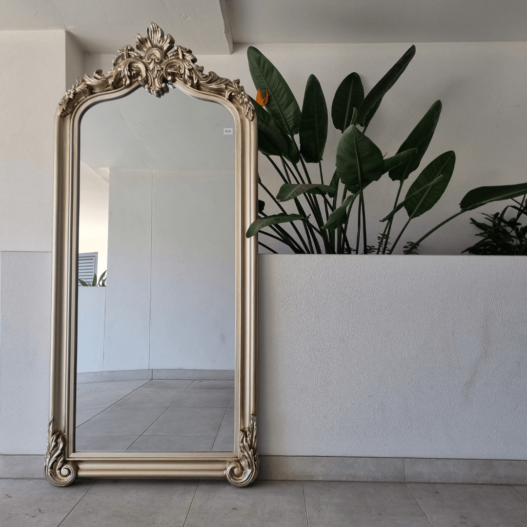 Arch Ornate silver arched mirror with a decorative crested frame