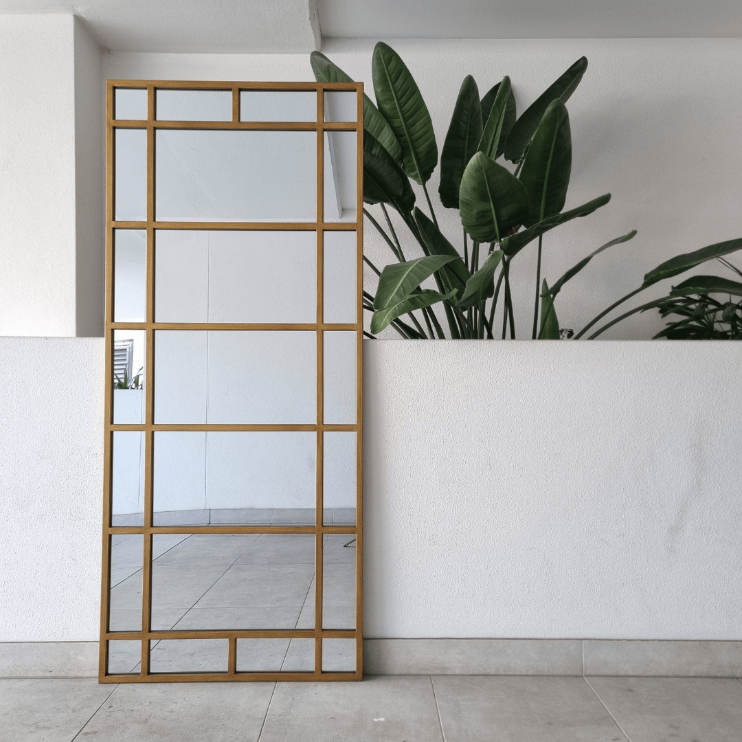 Brooklyn gold window-pane wall mirror with a steel grid frame