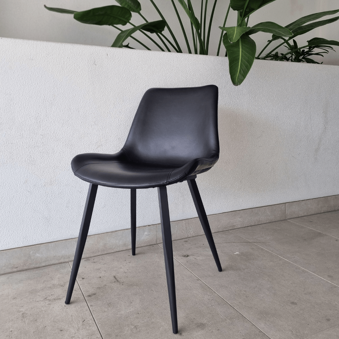 Tamar dining chair in black faux leather with slim legs