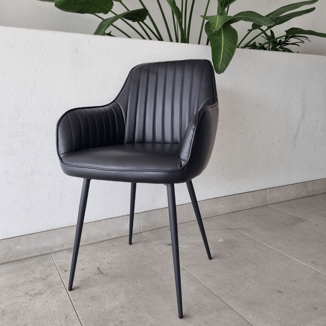 Zara dining chair in charcoal ribbed velvet with armrests